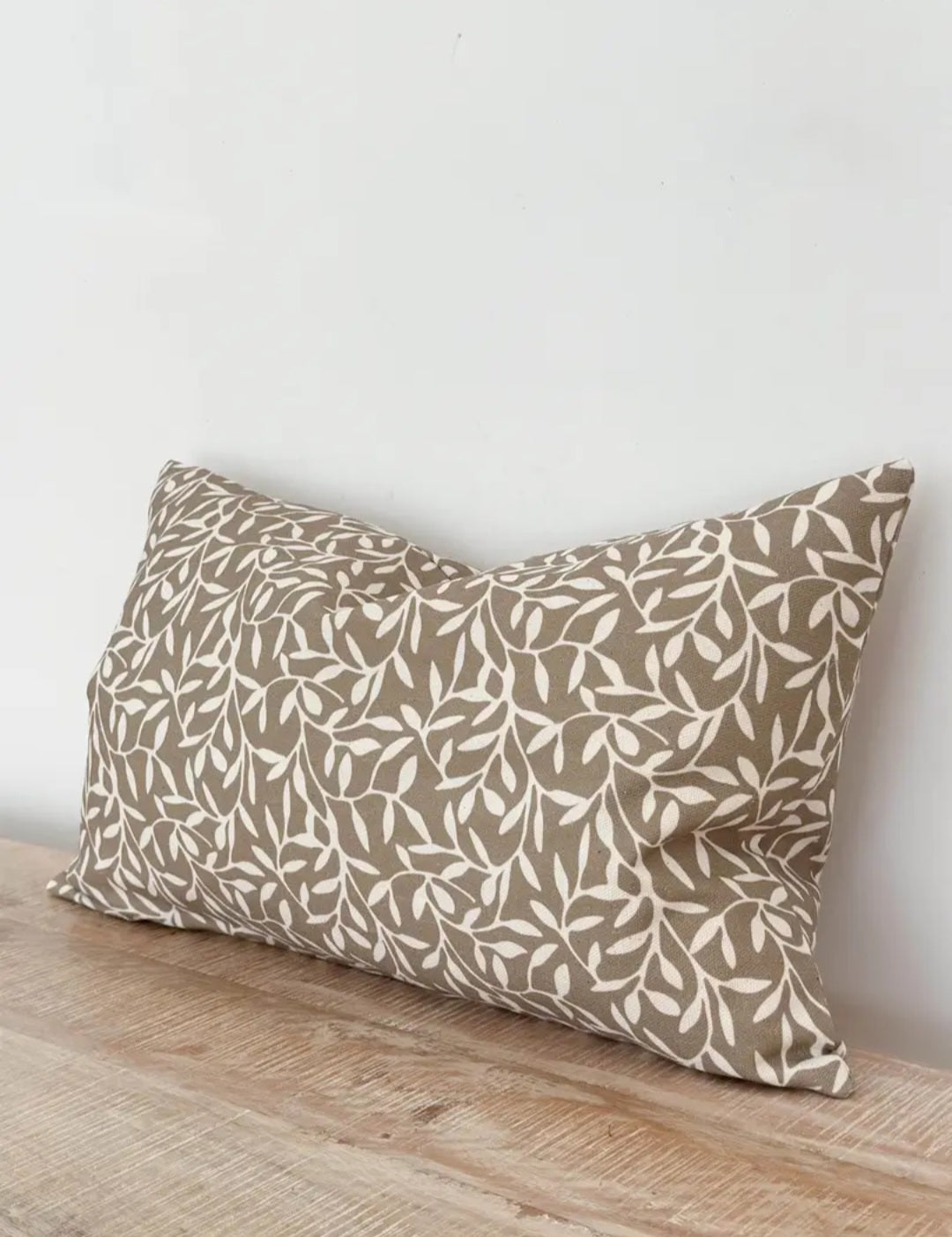 Olive-green leaf-print lumbar cushion cover, 50×30 cm—neutral botanical scatter for sofa or bed.