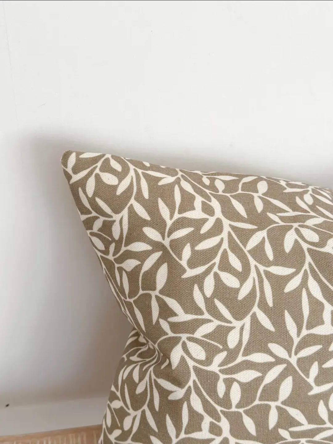 Rectangular 50×30 cm olive leaf print cushion cover—neutral lumbar scatter for living room or bedroom styling.
