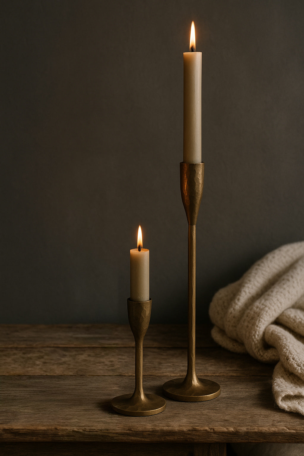 2. Textured brass candleholders on a rustic wooden mantel, classic country-style décor and lighting accessories from Doyle’s Lodge Interiors UK & Ireland.