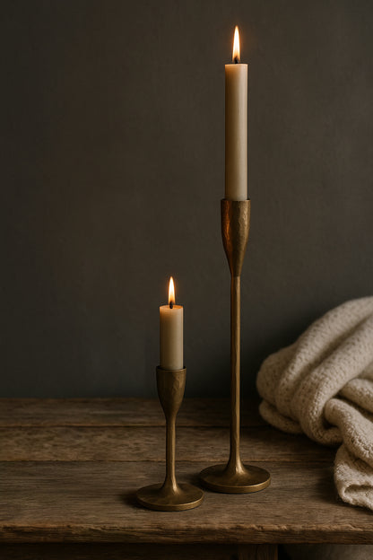 2. Textured brass candleholders on a rustic wooden mantel, classic country-style décor and lighting accessories from Doyle’s Lodge Interiors UK & Ireland.