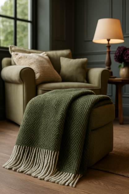 Taylor & Walton Lamb’s Tail Throw in olive – 130x170cm wool blend blanket with tasselled edge, soft and cosy for sofa or bed styling.