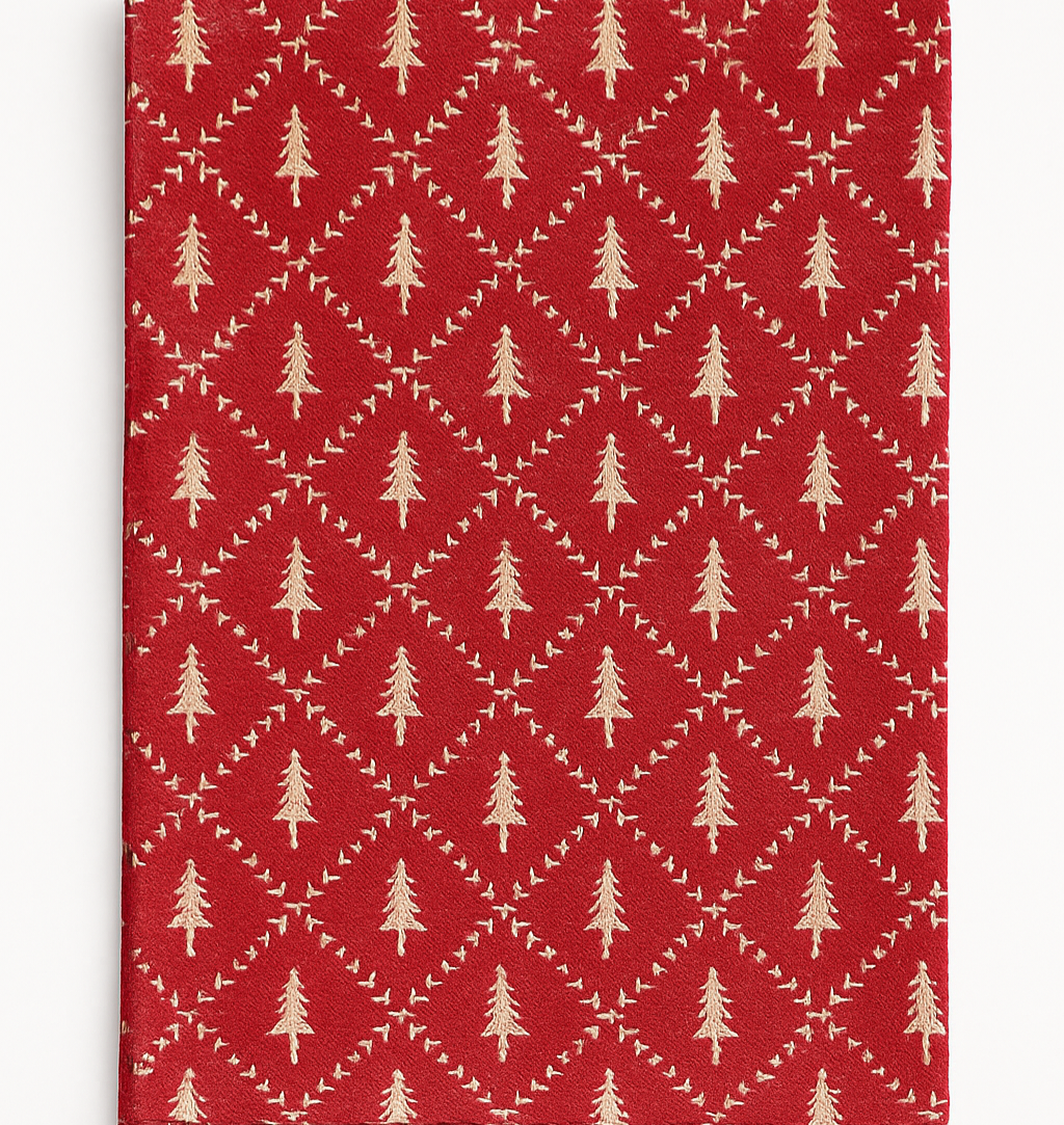 Traditional red Christmas runner with subtle tree pattern — festive table styling inspiration.