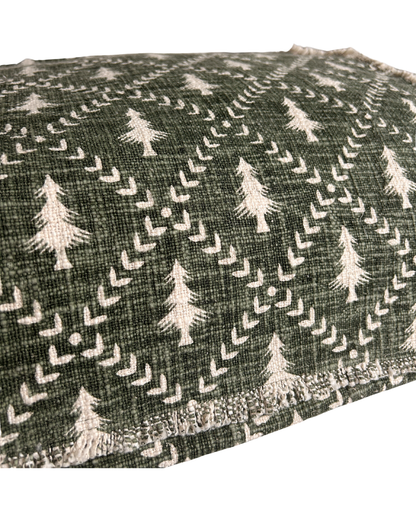 Tree Trellis Table Runner in Eucalyptus by Walton & Co styled on a festive dining table with natural Christmas décor.