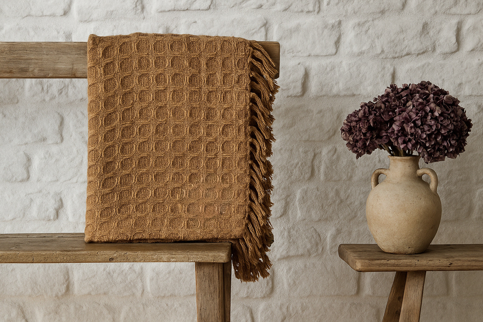 Walton & Co waffle throw in saffron – 100% cotton mustard blanket, 130x170cm, textured weave with tasselled edge for sofa or bed styling.