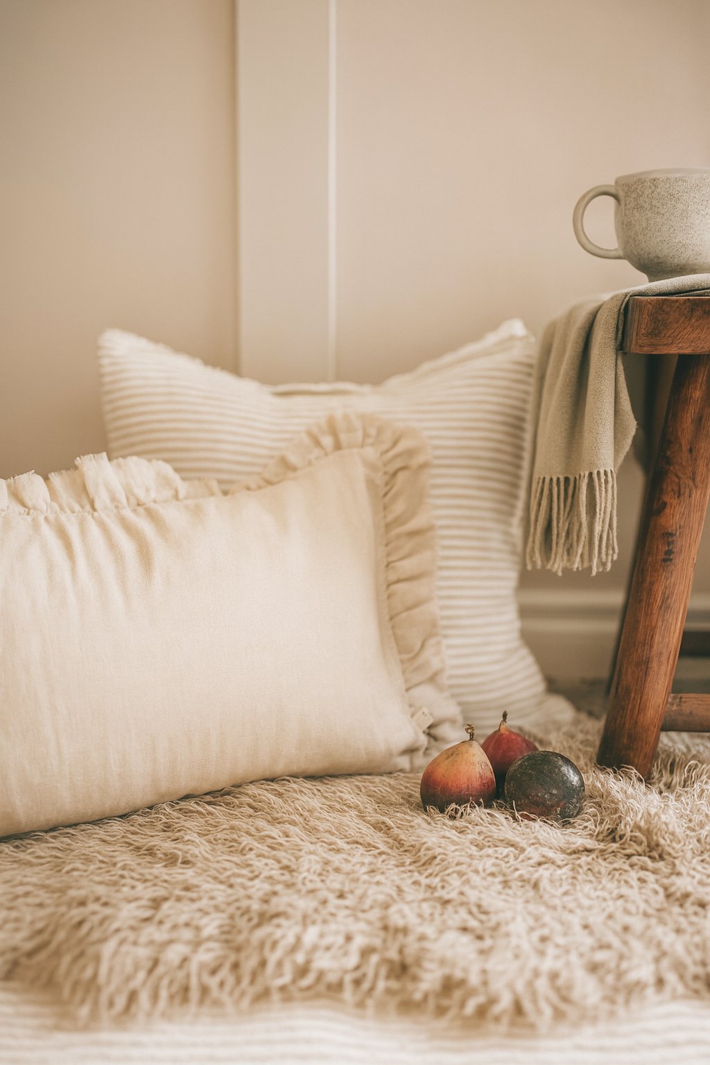 Cozy living room scene neutral cushions for country living