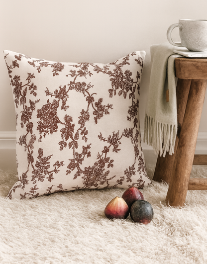 Plum Floral cushion cover on neutral rug with figs and throw – cosy home decor, country interiors, autumn styling inspiration